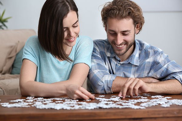 Couple working on a puzzle