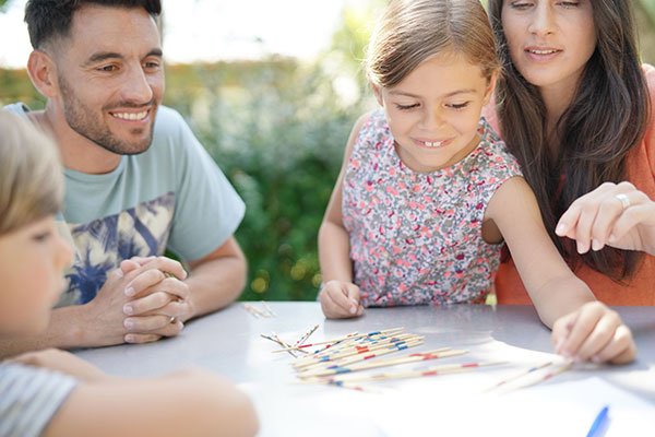 Family Playing Board Game