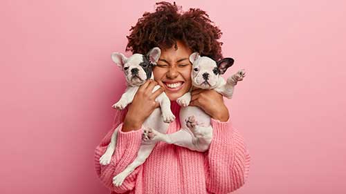 Woman with puppies